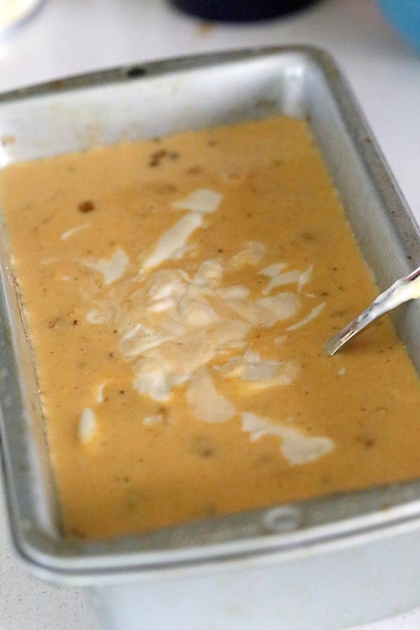 vegan ice cream recipe  vegan carrot cake ice cream base being swirled with a fork
