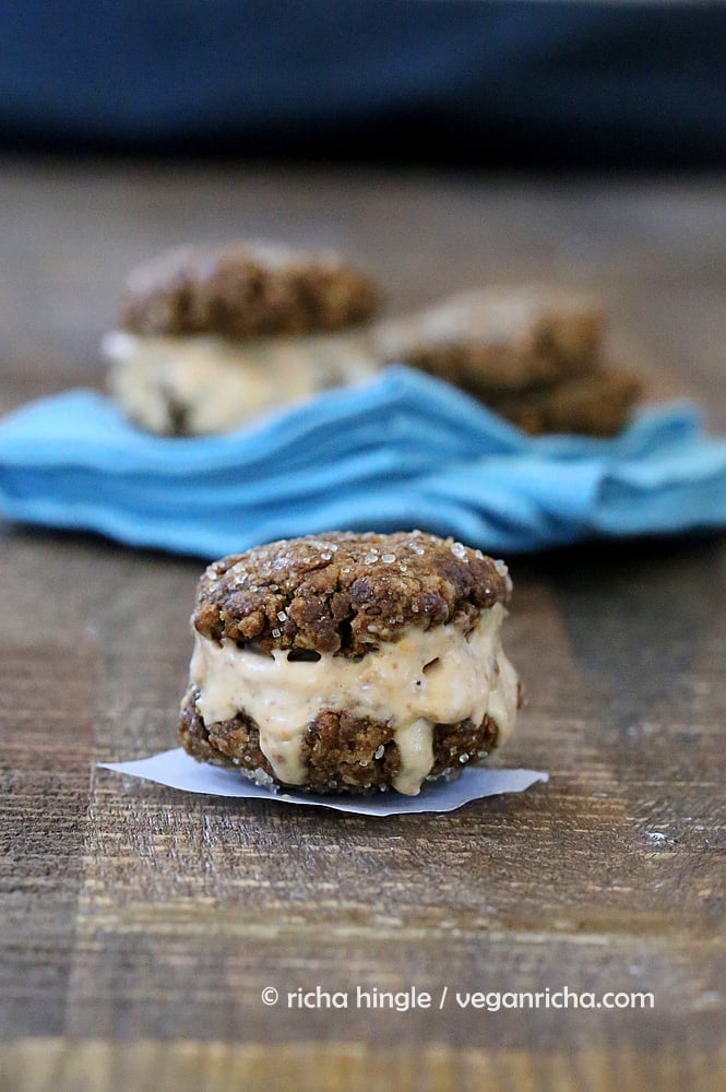 vegan ice cream recipe  Vegan Ginger Molasses Cookie Carrot Cake Ice Cream Sandwich on a rustic wooden table