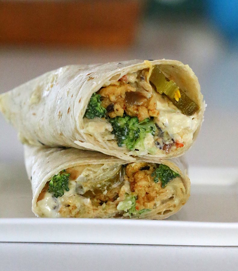 vegan wrap recipe  two stacked Tofu Wraps filled with Tempeh Scramble, Jalapeno Popper Dip and Broccoli