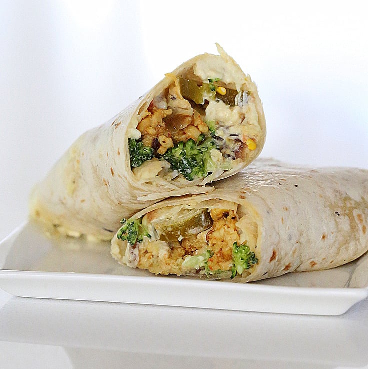 Vegan Tempeh Scramble, Jalapeno Popper Dip, Broccoli Wraps on a white plate