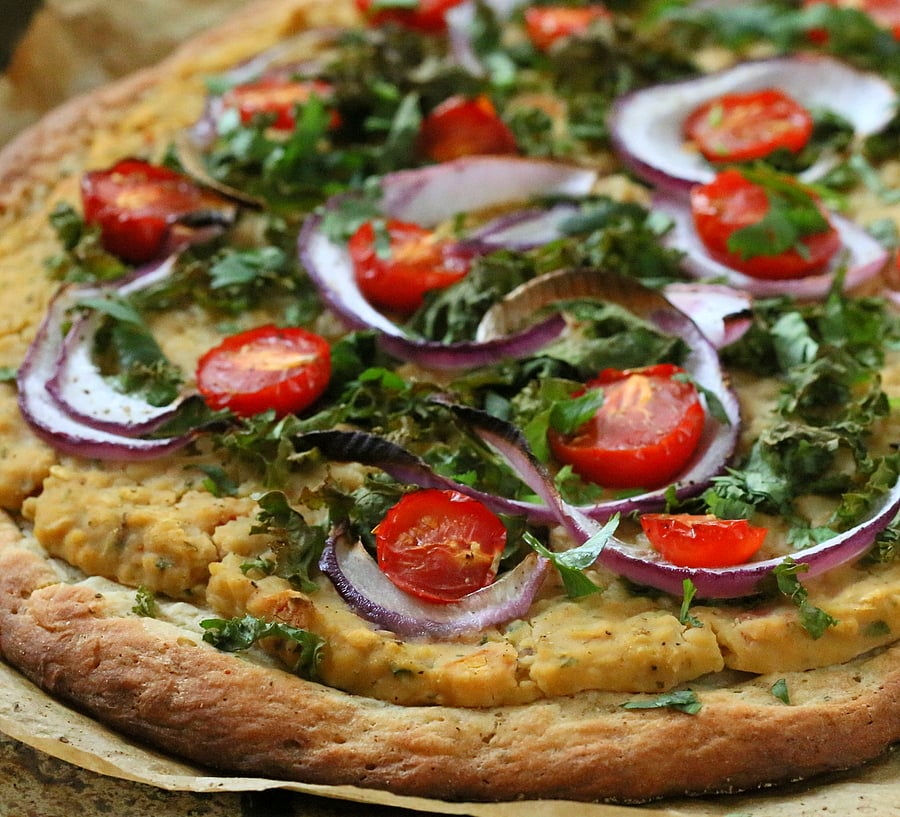 Vegan Roasted Hatch Chile White Bean Cheesy Hummus, Kale, Cherry Tomato Pizza on Quinoa crust