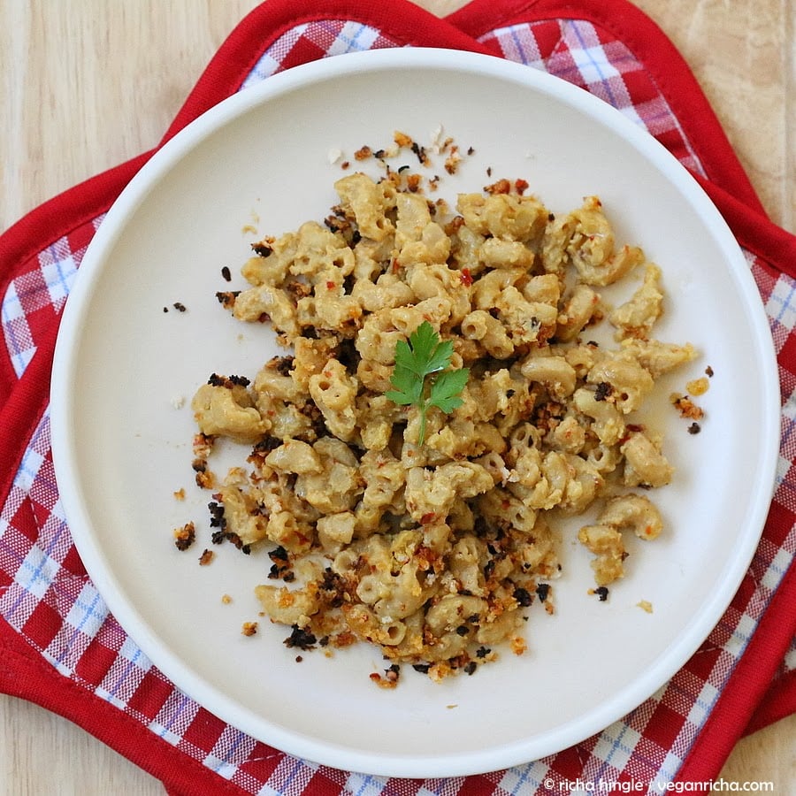 Cajun mac and cheese overhead shot of a serving of vegan Cajun mac and cheese topped with toasted breadcrumbs