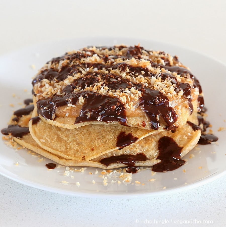 Vegan Samoa Cookie Pancakes with salted Date caramel, toasted coconut, chocolate drizzle. Weekend Brunch or breakfast. Can be gluten-free. | VeganRicha.com #vegan #breakfast #recipe