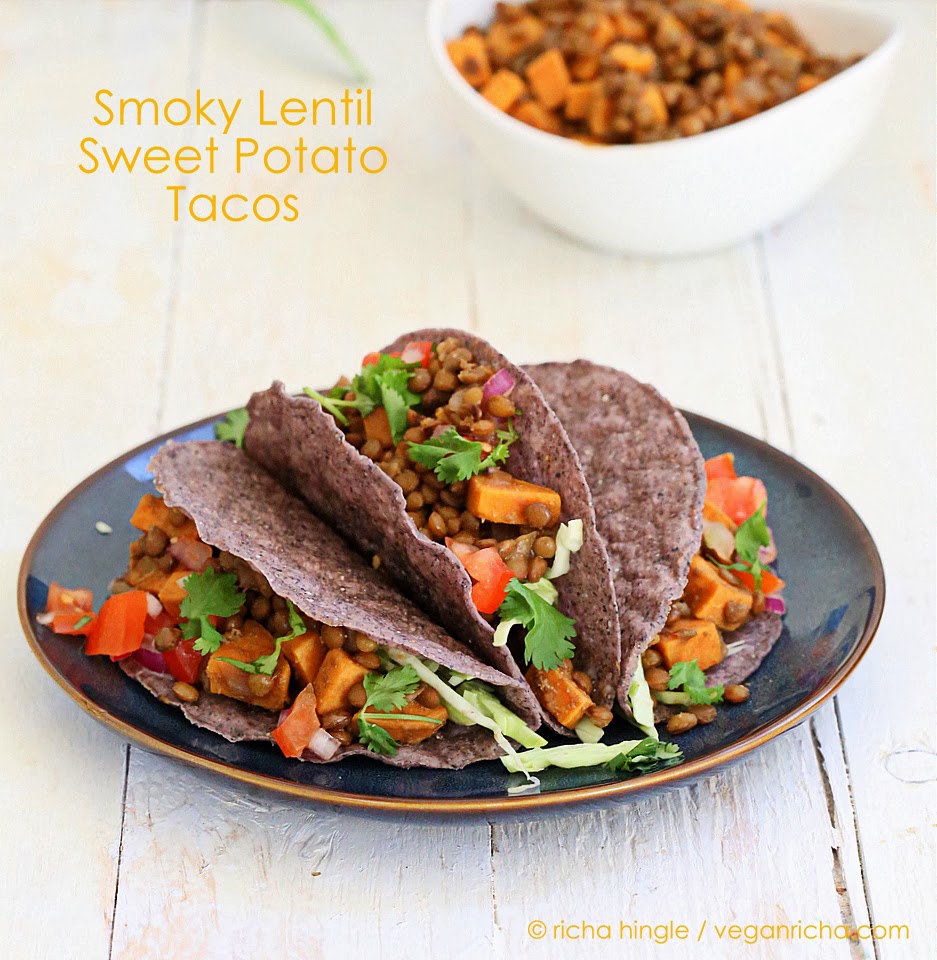 Smoky lentil and sweet potato tacos on a blue plate