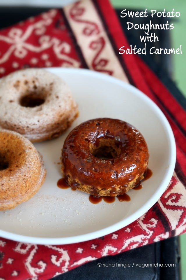 recipe for vegan donuts  three vegan baked sweet potato donuts on a white plate
