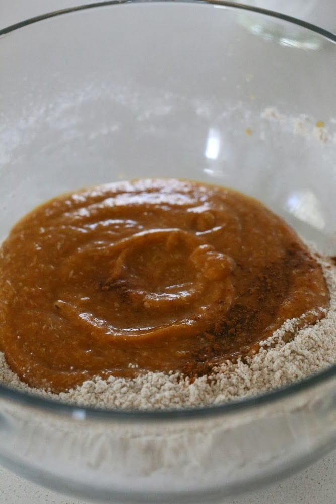 sweet potato biscuits  sweet potato puree being mixed with dry ingredients to make vegan sweet potato biscuits
