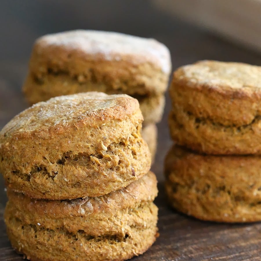 sweet potato biscuits close-up of vegan whole wheat sweet potato biscuits on a wooden board