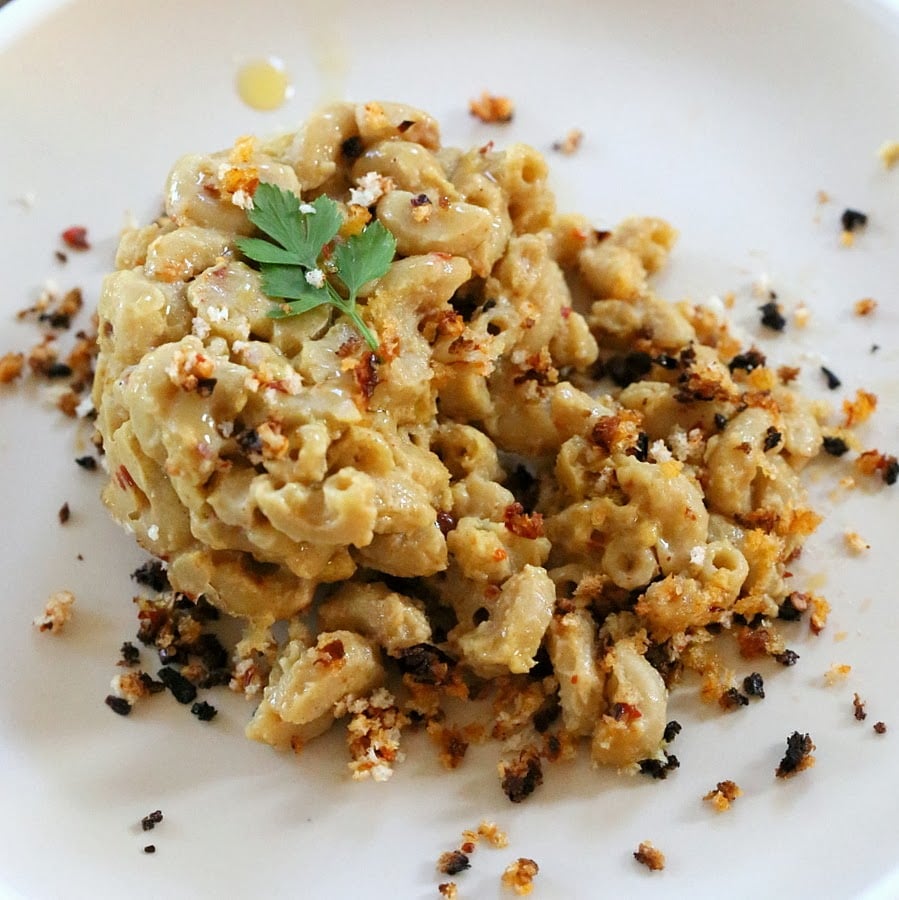 Cajun mac and cheese close-up of a serving of dairy-free spicy Cajun mac and cheese served with toasted breadcrumb topping
