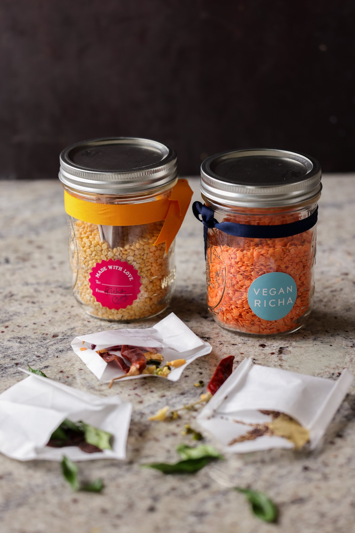 open jars of lentil soup mix with open spice pouches