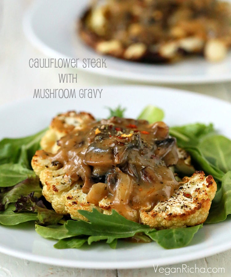 Cauliflower Steaks with Mushroom Gravy. Roasted Cauliflower Slices with vegan mushroom sauce | https://veganricha.com #Vegan #Glutenfree #holiday #Cauliflower