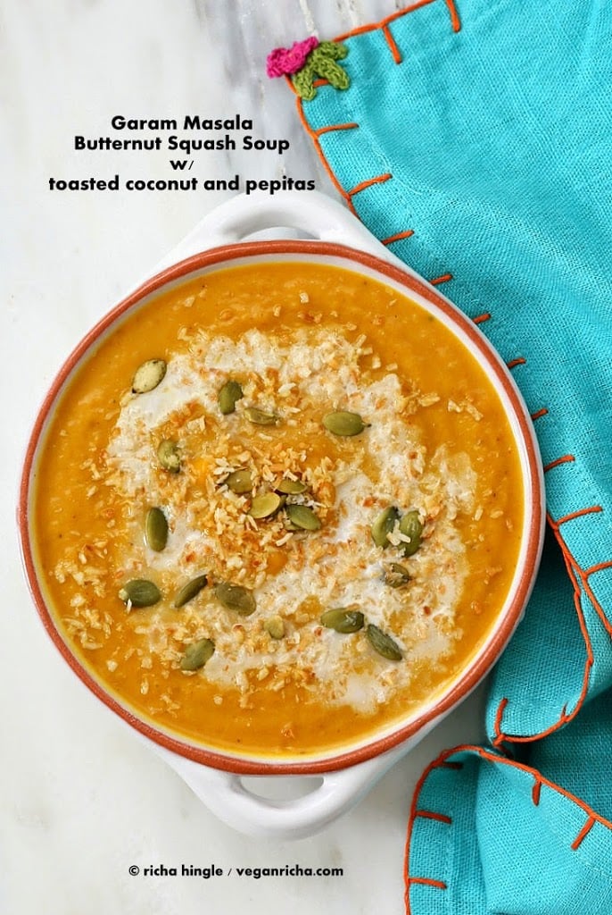 Vegan Curried Butternut Squash Soup with a dash of garam masala and garnished with cinnamony toasted coconut and pepitas | VeganRicha.com #vegan #glutenfree #soyfree #nutfree #soup