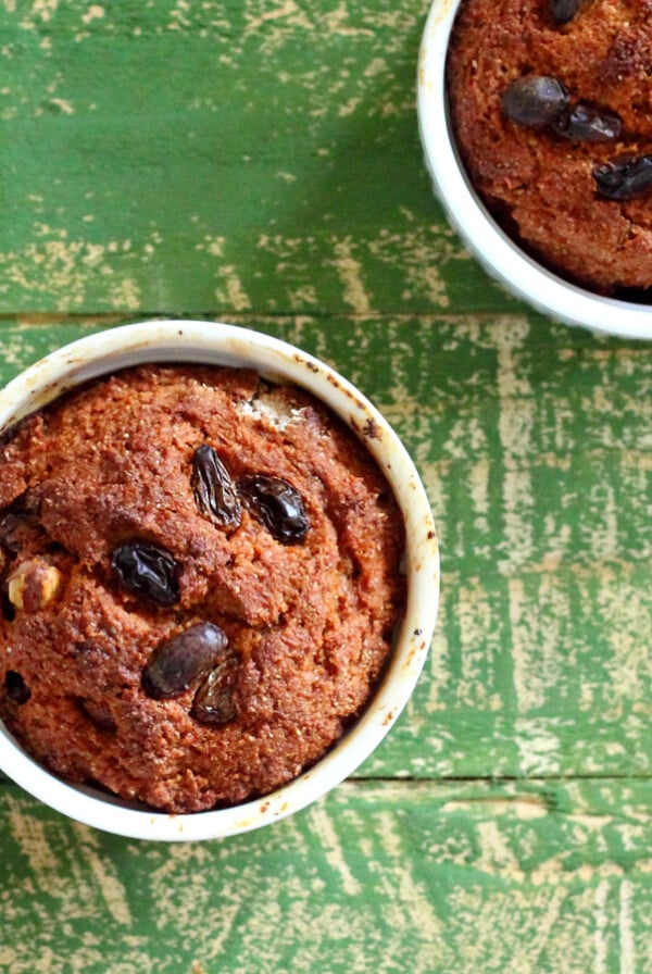 A top down shot of an oil free carrot cake in a ramikin