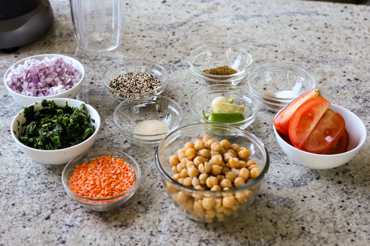 chickpea lentil spinach stew ingredients on the kitchen counter