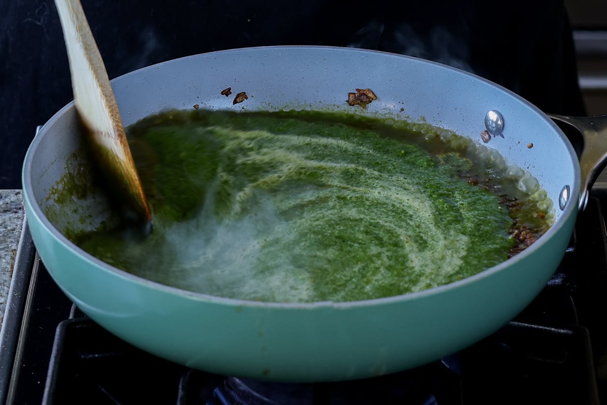 stirring in the spinach puree