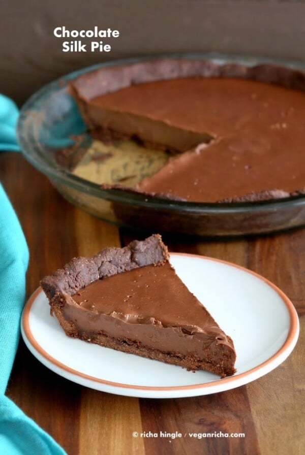 This silky smooth Dark Chocolate silk Pie with Chocolate almond Crust is surely going to be crowd pleaser. Free of Dairy, egg, corn, soy, gluten. Can be made corn-free with a different starch such as arrowroot or tapioca. #vegan #glutenfree #veganricha