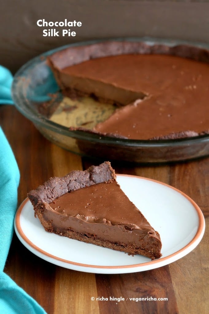 Vegan Chocolate Silk Pie is filled with smooth Dark chocolate filling, & Almond Chocolate Crust. topped with cashew cream. Gluten-free Soy-free Vegan VeganRicha.com