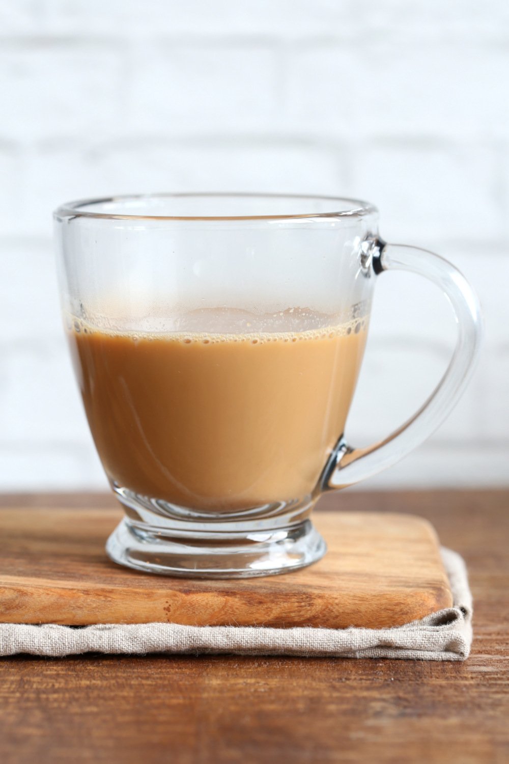 Vegan Indian Masala Chai. Fabulous almond milk tea with fresh ginger and homemade chai spice blend with cardamom, cinnamon, pepper. Flavorful traditional Indian Chai made #vegan #veganricha #veganchai