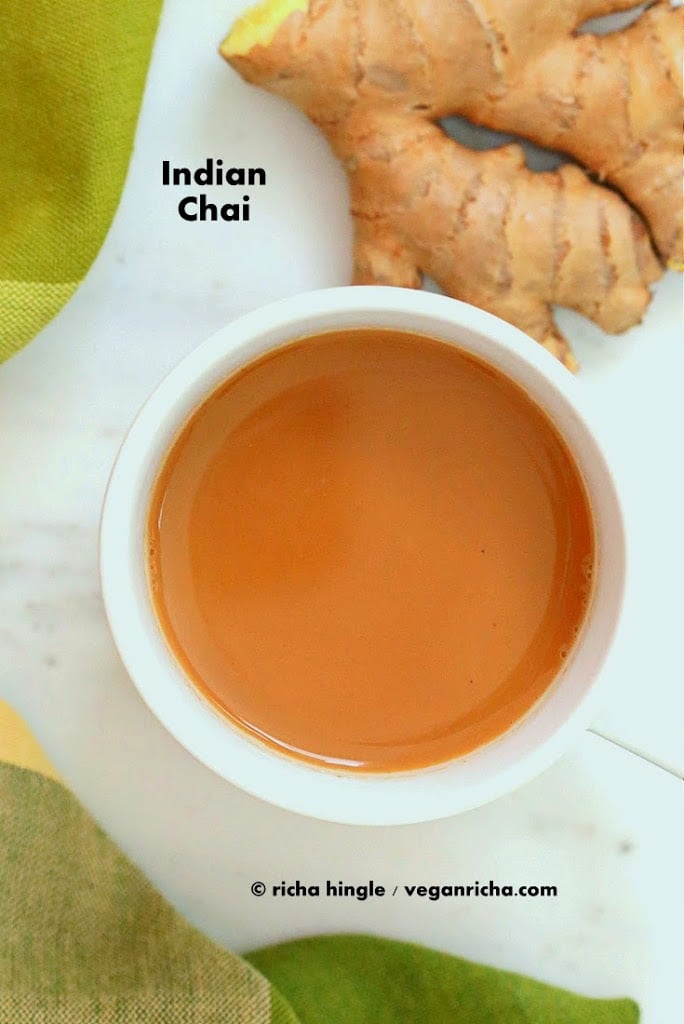Vegan Indian Masala Chai. Fabulous almond milk tea with fresh ginger and homemade chai spice blend with cardamom, cinnamon, pepper. Flavorful traditional Indian Chai made #vegan #veganricha