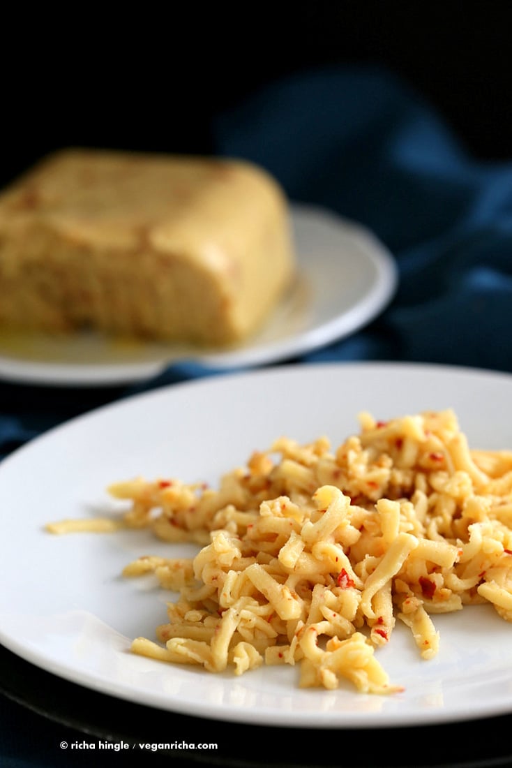 This Dairy free Vegan Pepper Jack Cheese is easy, ready within minutes & it shreds, melts. Made with almond milk, nooch, chickpea flour. Almond Milk Cheese | VeganRicha.com #vegan #cheese