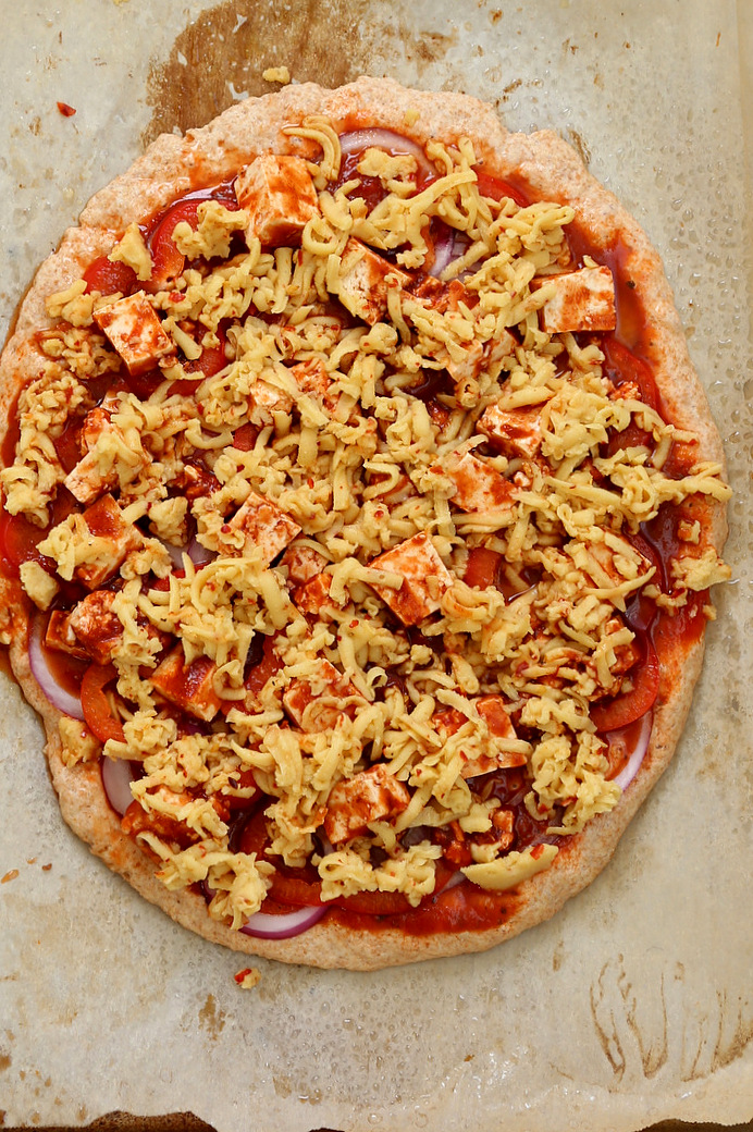 Sriracha BBQ Tofu Pizza with Pepper Jack. Quick Vegan Pizza with a one rise Thin Spelt Crust, topped with Tofu marinated in bbq and sriracha sauce, loaded with Almond milk cheese. | VeganRicha.com #vegan #pizza