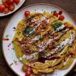chickpea flour omelette topped with vegan yogurt