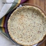overhead shot of a vegan almond flour pie crust in a pyrex baking dish
