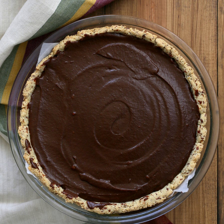 vegan pumpkin pie  overhead shot of a whole Vegan Chocolate Pumpkin Pie in a pyrex pie dish
