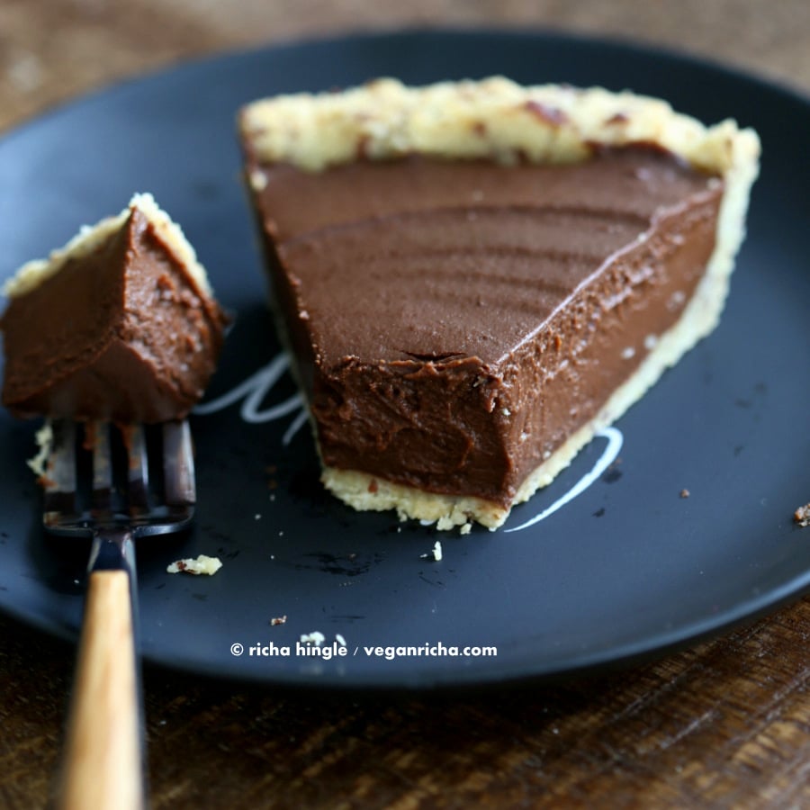 vegan pumpkin pie  a slice of Vegan Chocolate Pumpkin Pie with one forkful missing