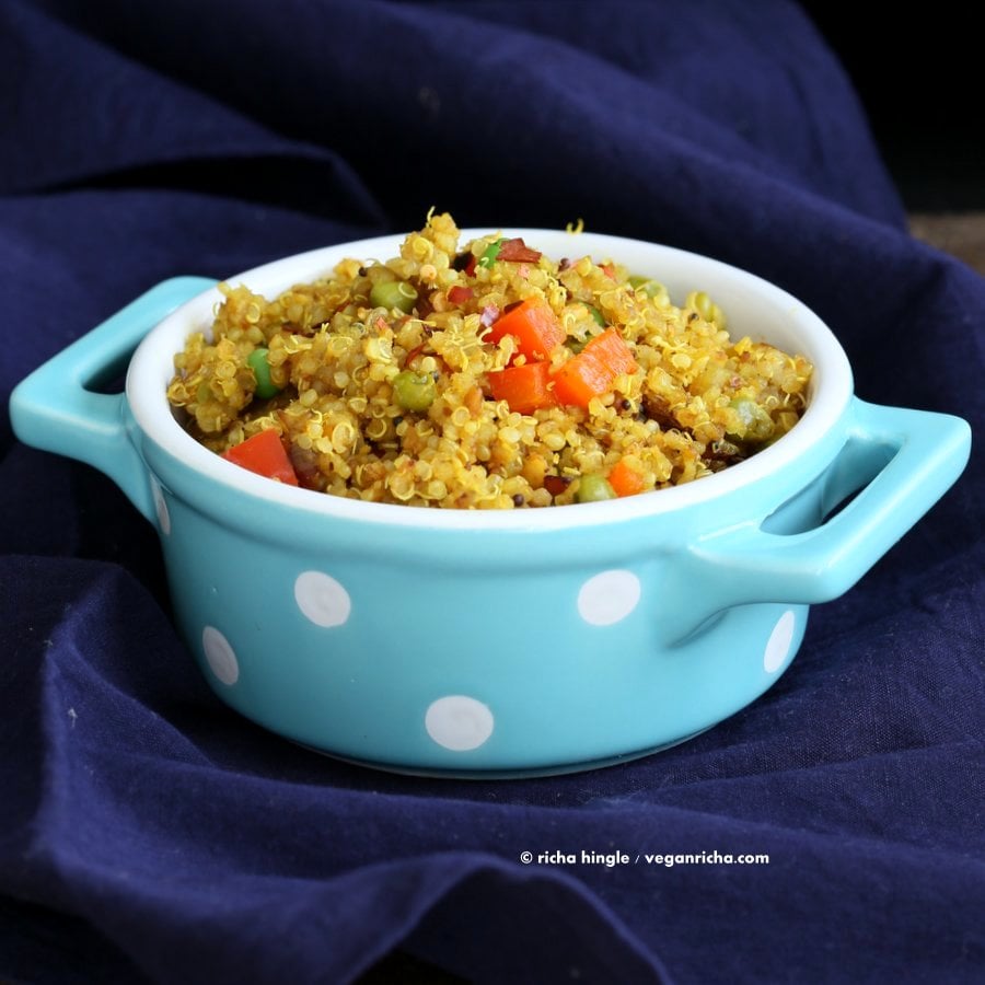 South Indian Quinoa Salad in a blue polka dot dish on a blue towel
