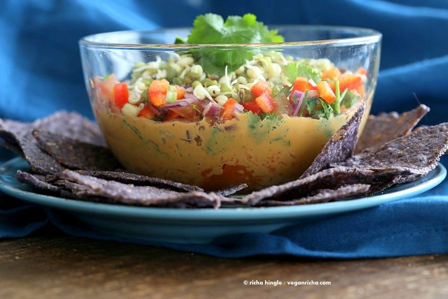 This Thai layered Dip has carrots, Peanut butter sauce, spicy salsa, cilantro, sprouts, & peanuts. all layered up for the perfect appetizer. #Vegan #Glutenfree #Recipe #VeganRicha | VeganRicha.com