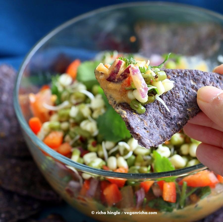 This Thai layered Dip has carrots, Peanut butter sauce, spicy salsa, cilantro, sprouts, & peanuts. all layered up for the perfect appetizer. #Vegan #Glutenfree #Recipe #VeganRicha | Vegan Richa