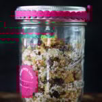 red lentil granola in a decorated mason jar for gifting