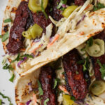 close-up of BBQ tempeh wraps on a plate