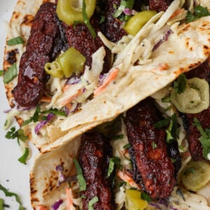 close-up of BBQ tempeh wraps on a plate