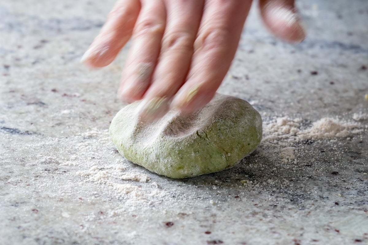 flattening a dough ball