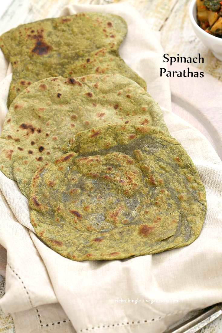Spinach Paratha flatbread. Palak Paratha. Blended Spinach in the dough makes moist green flatbread. Vegan Yeast-free Indian Recipe. Use as Spinach Tortilla or stuff with favorite fillings. | VeganRicha.com