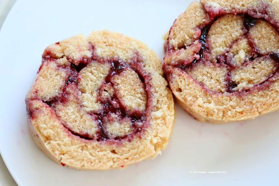 Vegan Swiss roll with Vegan Yellow cake and fruit preserves. Easy Swiss roll Cake | Vegan Richa