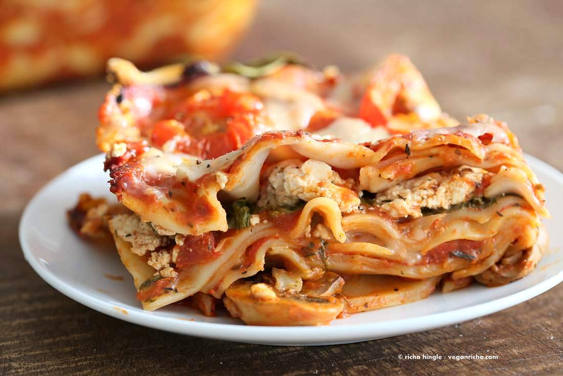 VVegan Veggie Lasagna. Easy Lasagna for 2 with herbed mushrooms, greens, tofu thyme ricotta, chao cheese slices . Vegan Recipe | VeganRicha.com