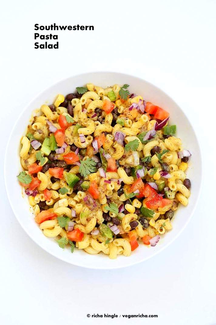 Our vegan southwestern pasta salad with black bean dressing in a white bowl