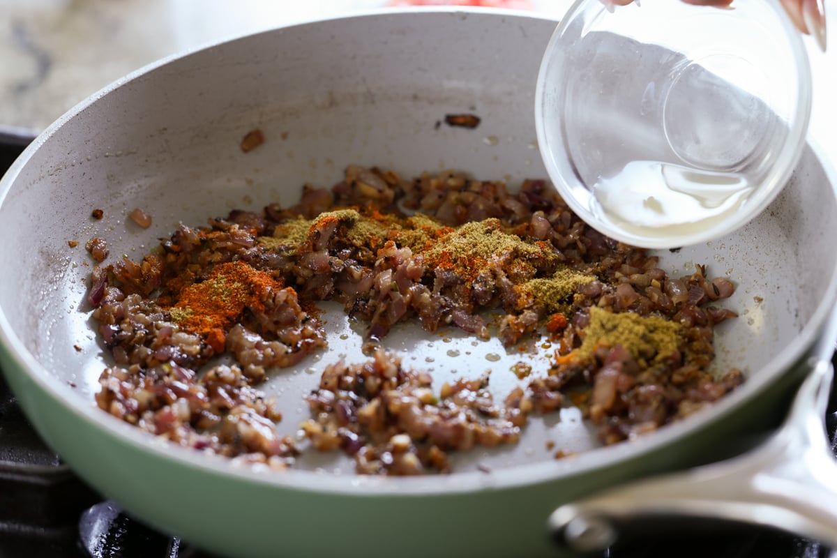 adding lemon juice to the onion mixture