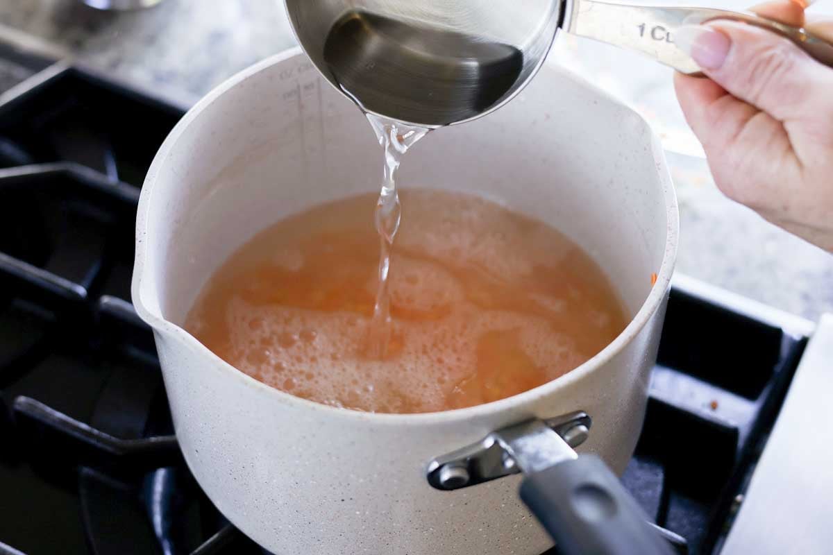 adding water to the lentils