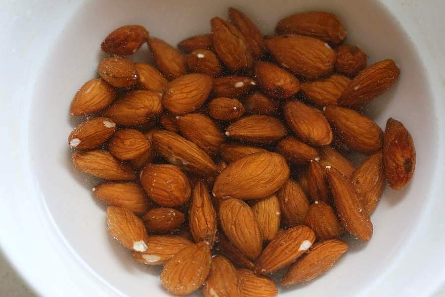 How to make Almond Milk with raw almonds or blanched almonds. Blanched almond milk has a less prominent flavor which works great for Indian Chai | Vegan Richa