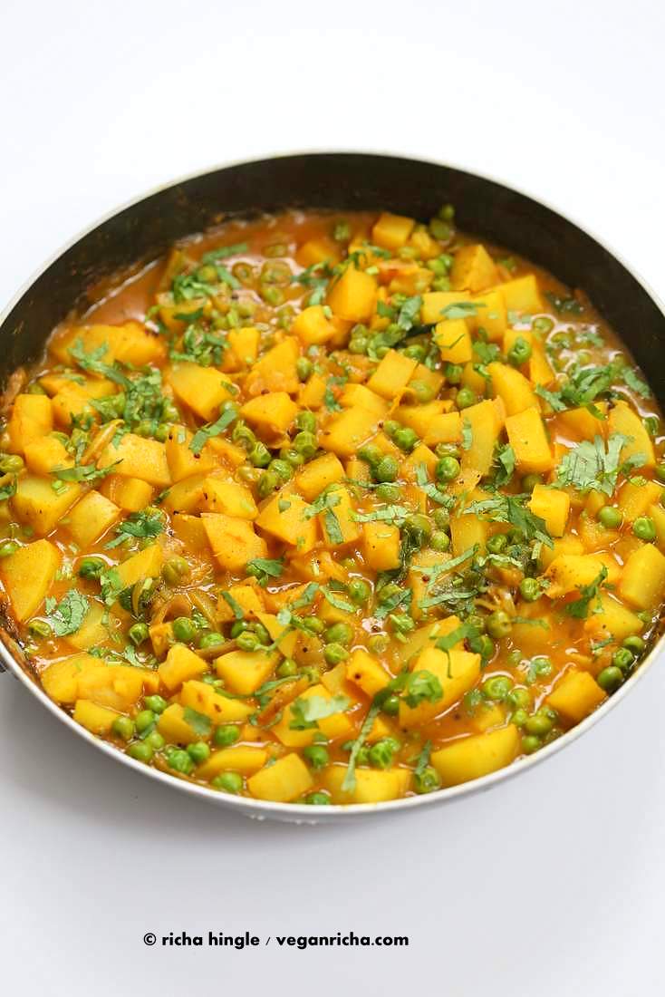 Vegan Bombay Potatoes and Peas | https://veganricha.com Easy Indian Spiced Potato and Pea curry. #vegan #glutenfree #soyfree #Indian