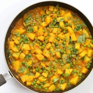 Vegan Bombay Potatoes and Peas | https://veganricha.com Easy Indian Spiced Potato and Pea curry. #vegan #glutenfree #soyfree #Indian #veganricha