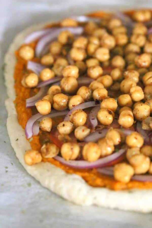 Chickpea Pumpkin Veggie Pizza with Basic Pizza crust. Pumpkin sauce spiced with herbs and spices, topped with spicy chickpeas, veggies and pepita parmesan | VeganRicha.com #vegan #pumpkin #chickpea #pizza #fall