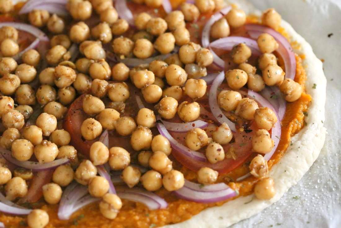 Chickpea Pumpkin Veggie Pizza with Basic Pizza crust. Pumpkin sauce spiced with herbs and spices, topped with spicy chickpeas, veggies and pepita parmesan | VeganRicha.com #vegan #pumpkin #chickpea #pizza #fall