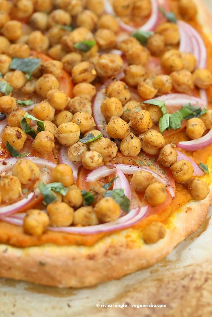 Chickpea Pumpkin Veggie Pizza with Basic Pizza crust. Pumpkin sauce spiced with herbs and spices, topped with spicy chickpeas, veggies and pepita parmesan | VeganRicha.com #vegan #pumpkin #chickpea #pizza #fall