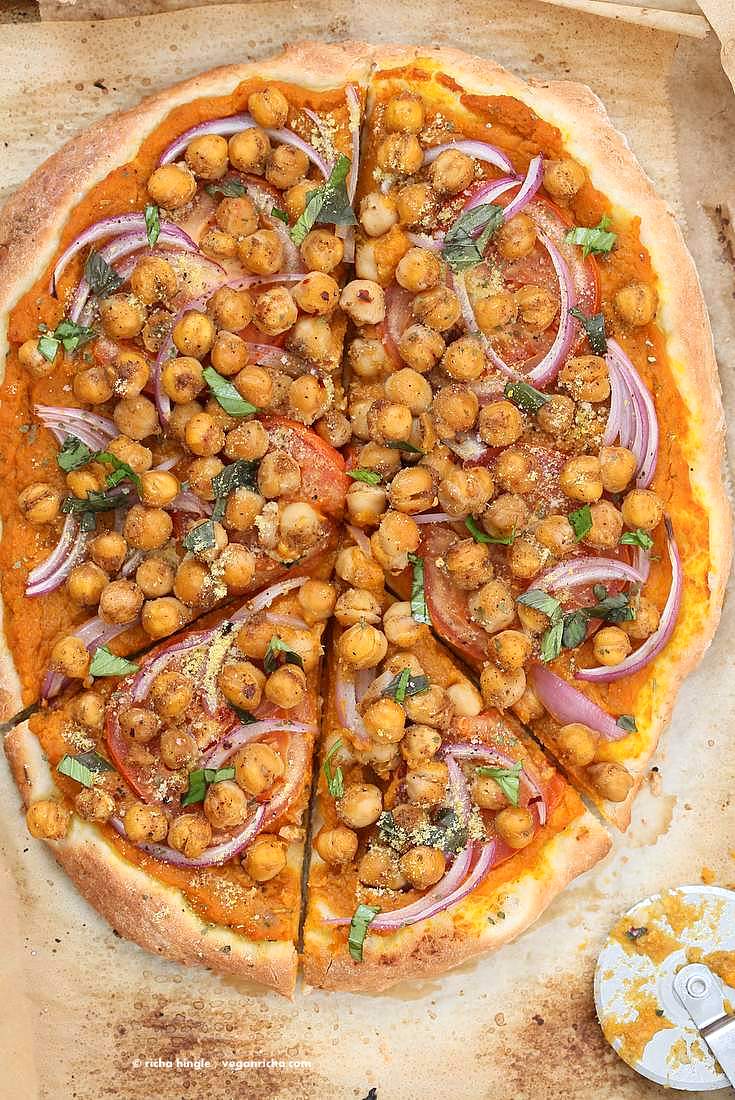 Chickpea Pumpkin Veggie Pizza with Basic Pizza crust. Pumpkin sauce spiced with herbs and spices, topped with spicy chickpeas, veggies and pepita parmesan | VeganRicha.com #vegan #pumpkin #chickpea #pizza #fall