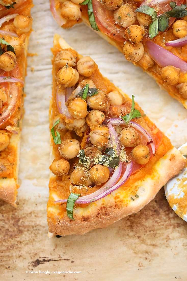 Chickpea Pumpkin Veggie Pizza with Basic Pizza crust. Pumpkin sauce spiced with herbs and spices, topped with spicy chickpeas, veggies and pepita parmesan | VeganRicha.com #vegan #pumpkin #chickpea #pizza #fall