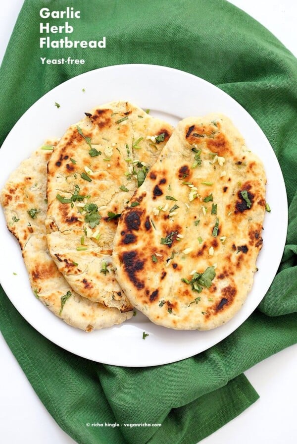 Garlic flatbread recipe No Yeast. This easy garlic herb flatbread has no yeast, doesn't need hours to rest, and has a secret ingredient. | VeganRicha.com #vegan #flatbread #recipe #yeastfree #veganricha